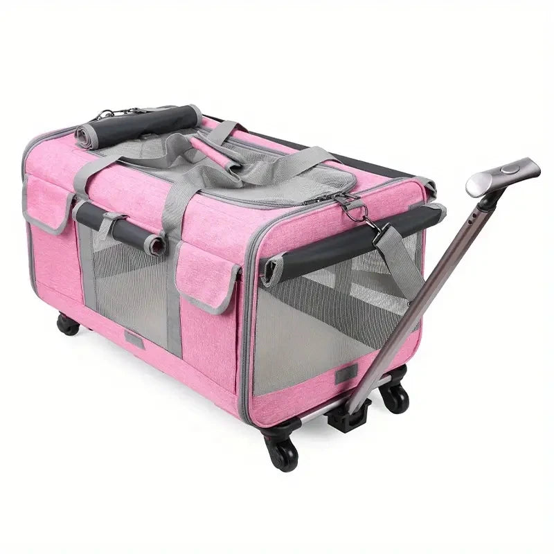 Pink pet carrier with wheels and a handle on a white background