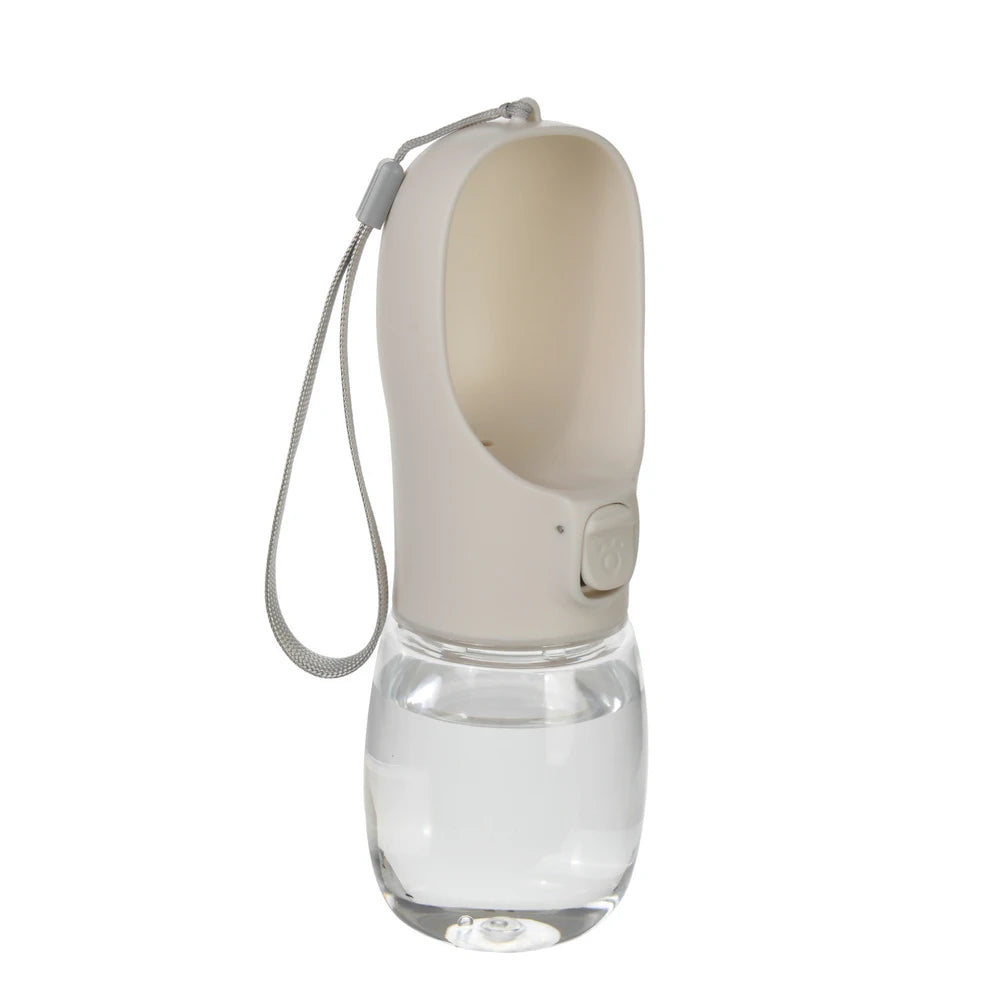 Pet Water Bottle with built-in drinking bowl, portable, leak-proof and travel-friendly design for dogs and cats.