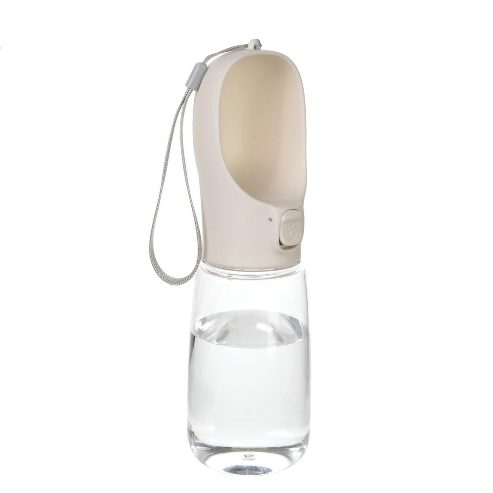 Pet Water Bottle with built-in drinking bowl, portable, leak-proof and travel-friendly design for dogs and cats.